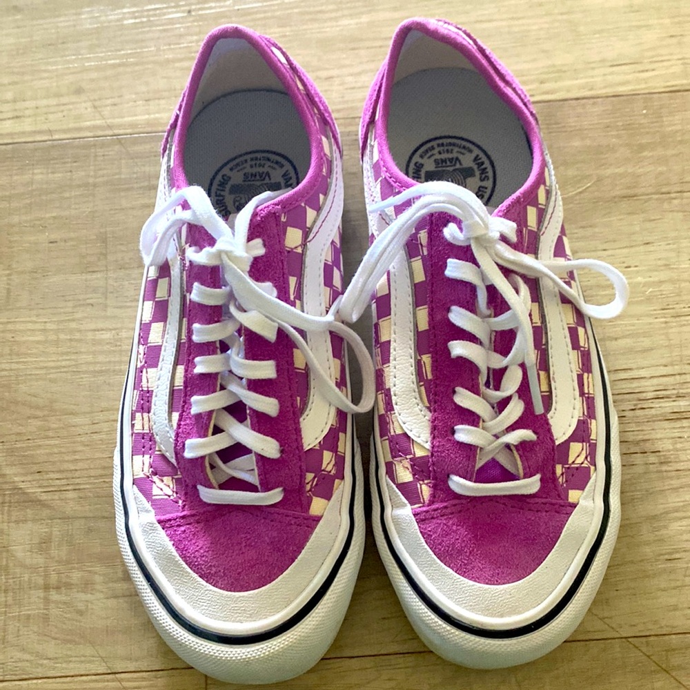 Brand new purple checkerboard vans.